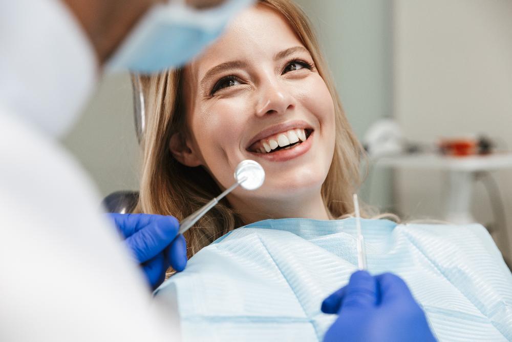 A patient undergoing teeth cleanings and Examination in Sterling, CO