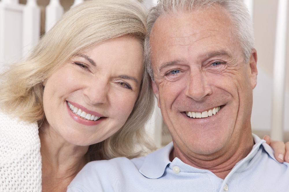 Couple smiling after getting Dentures and Partials in Sterling, CO