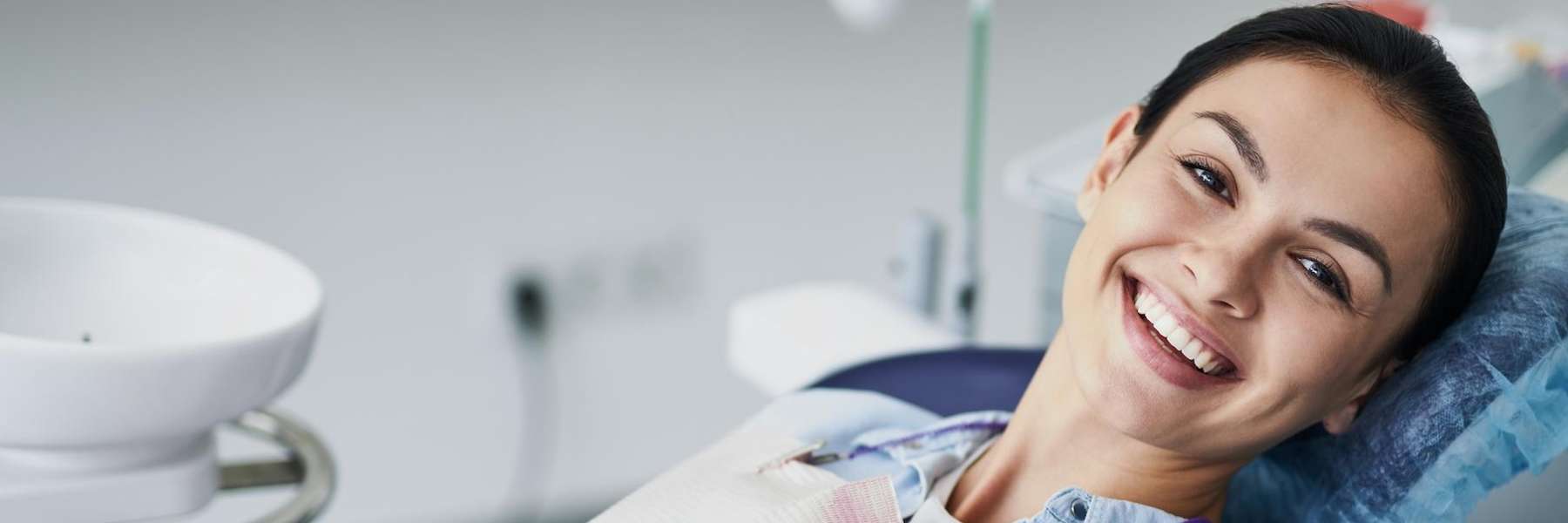 A lady smiling after dental cleaning at Pradera dental in Sterling, CO.